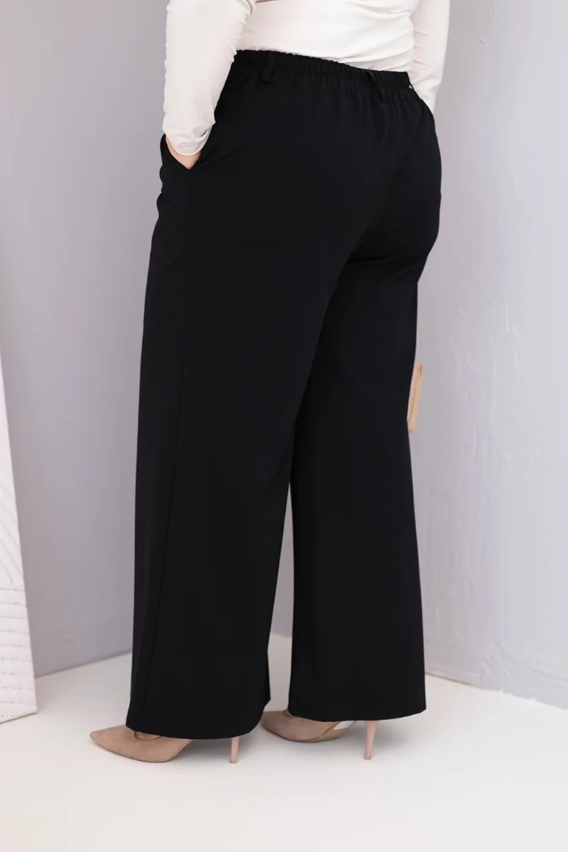Spodnie damskie Plus Size z szeroką nogawką i wysokim stanem czarne 3 Spodnie damskie Plus Size z szeroką nogawką i wysokim stanem czarne - obrazek 3