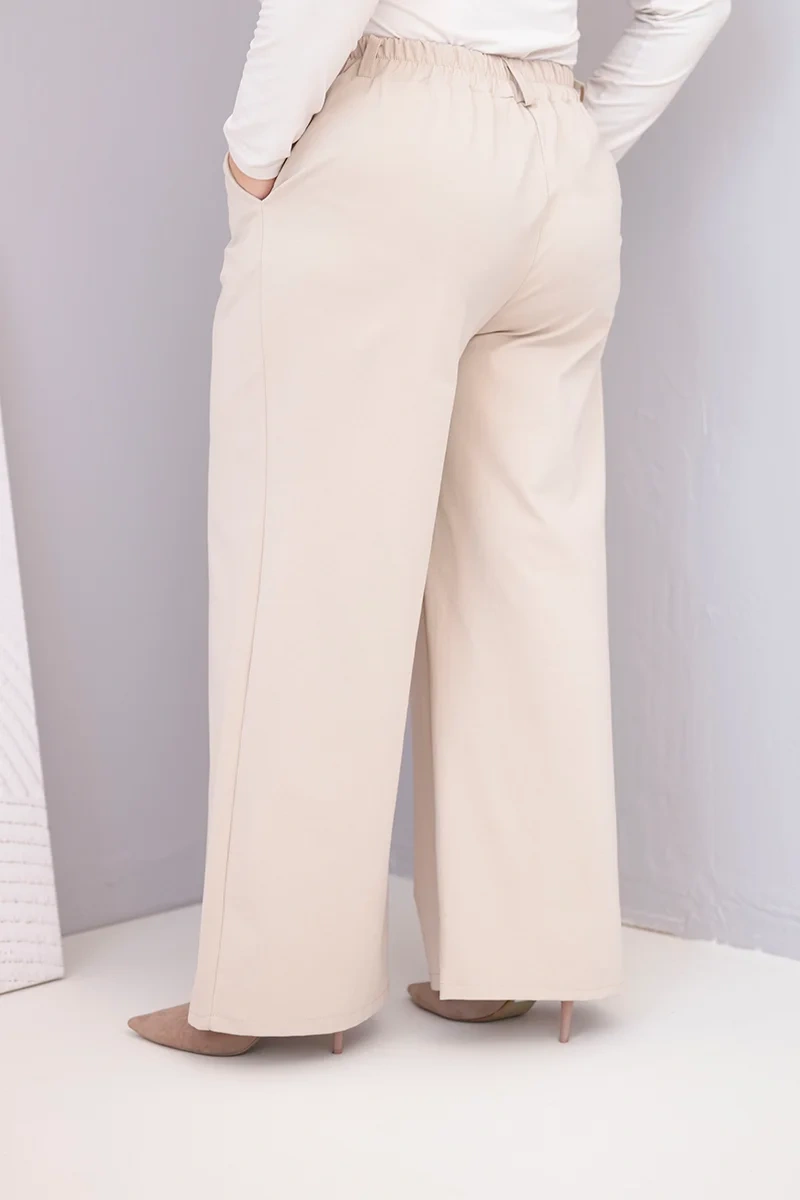 Spodnie damskie Plus Size z szeroką nogawką i wysokim stanem beżowe 3 Spodnie damskie Plus Size z szeroką nogawką i wysokim stanem beżowe - obrazek 3