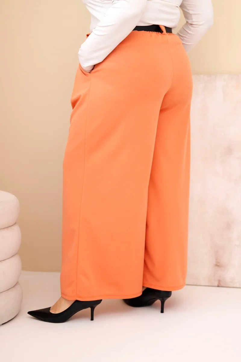 Spodnie damskie Plus Size wiskozowe z szeroką nogawką i paskiem morelowe 3 Spodnie damskie Plus Size wiskozowe z szeroką nogawką i paskiem morelowe - obrazek 3